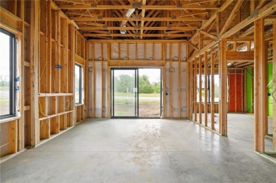 Discover modern, low-maintenance luxury living in this stunning on The Golf Club of Kansas in Kansas - for sale on GolfHomes.com, golf home, golf lot