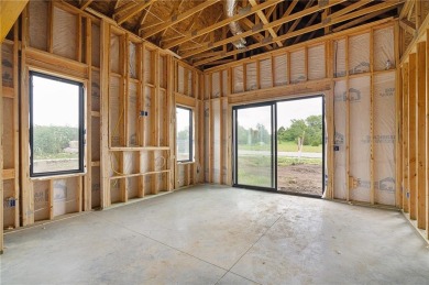 Discover modern, low-maintenance luxury living in this stunning on The Golf Club of Kansas in Kansas - for sale on GolfHomes.com, golf home, golf lot