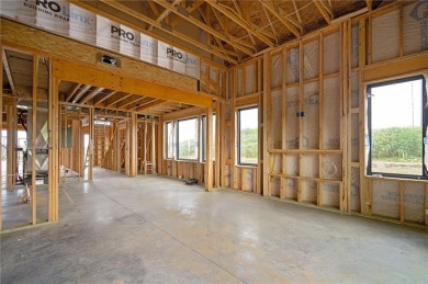 Discover modern, low-maintenance luxury living in this stunning on The Golf Club of Kansas in Kansas - for sale on GolfHomes.com, golf home, golf lot