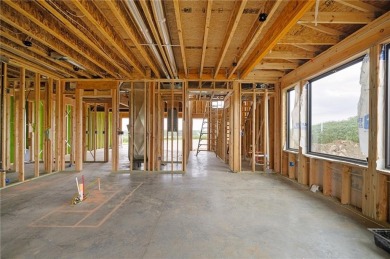 Discover modern, low-maintenance luxury living in this stunning on The Golf Club of Kansas in Kansas - for sale on GolfHomes.com, golf home, golf lot