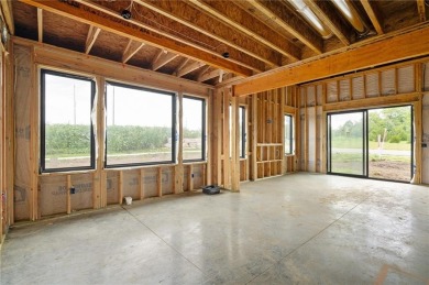 Discover modern, low-maintenance luxury living in this stunning on The Golf Club of Kansas in Kansas - for sale on GolfHomes.com, golf home, golf lot