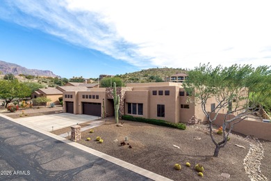 This exceptional home showcases a stunning open-concept design on Superstition Mountain Club - Lost Gold in Arizona - for sale on GolfHomes.com, golf home, golf lot