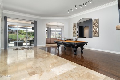 This exceptional home showcases a stunning open-concept design on Superstition Mountain Club - Lost Gold in Arizona - for sale on GolfHomes.com, golf home, golf lot