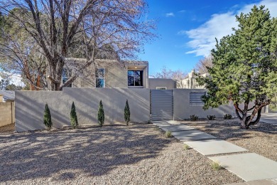 An amazing contemporary split-level home near Arroyo Del Oso on Arroyo Del Oso Golf Course in New Mexico - for sale on GolfHomes.com, golf home, golf lot