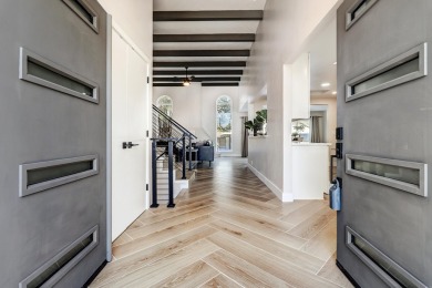 An amazing contemporary split-level home near Arroyo Del Oso on Arroyo Del Oso Golf Course in New Mexico - for sale on GolfHomes.com, golf home, golf lot