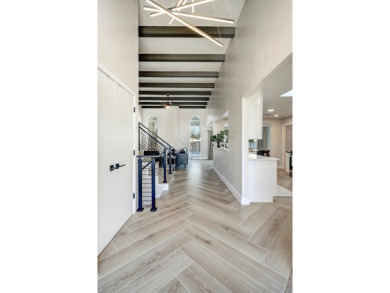 An amazing contemporary split-level home near Arroyo Del Oso on Arroyo Del Oso Golf Course in New Mexico - for sale on GolfHomes.com, golf home, golf lot