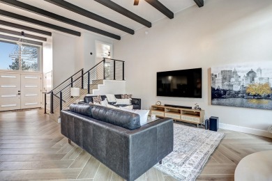 An amazing contemporary split-level home near Arroyo Del Oso on Arroyo Del Oso Golf Course in New Mexico - for sale on GolfHomes.com, golf home, golf lot