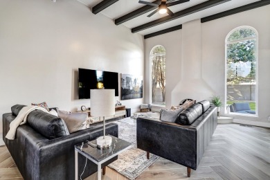 An amazing contemporary split-level home near Arroyo Del Oso on Arroyo Del Oso Golf Course in New Mexico - for sale on GolfHomes.com, golf home, golf lot