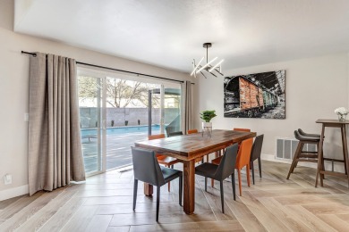 An amazing contemporary split-level home near Arroyo Del Oso on Arroyo Del Oso Golf Course in New Mexico - for sale on GolfHomes.com, golf home, golf lot