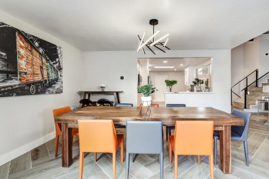 An amazing contemporary split-level home near Arroyo Del Oso on Arroyo Del Oso Golf Course in New Mexico - for sale on GolfHomes.com, golf home, golf lot