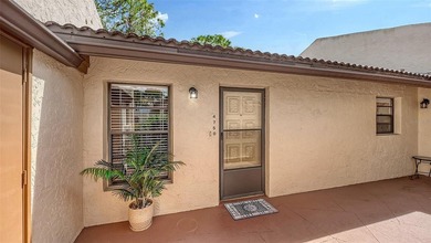 Must-see beautifully furnished villa, updated, end unit and a on The Meadows Golf and Country Club in Florida - for sale on GolfHomes.com, golf home, golf lot