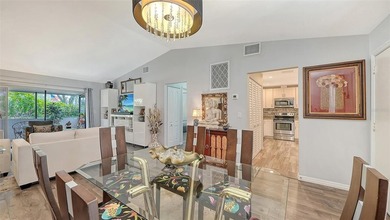 Must-see beautifully furnished villa, updated, end unit and a on The Meadows Golf and Country Club in Florida - for sale on GolfHomes.com, golf home, golf lot