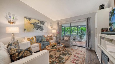 Must-see beautifully furnished villa, updated, end unit and a on The Meadows Golf and Country Club in Florida - for sale on GolfHomes.com, golf home, golf lot