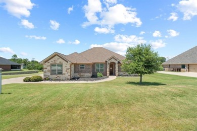 Beautifully maintained 4-bedroom, 2.5-bath home on a half-acre on Pecan Plantation Country Club in Texas - for sale on GolfHomes.com, golf home, golf lot