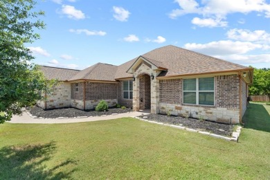 Beautifully maintained 4-bedroom, 2.5-bath home on a half-acre on Pecan Plantation Country Club in Texas - for sale on GolfHomes.com, golf home, golf lot
