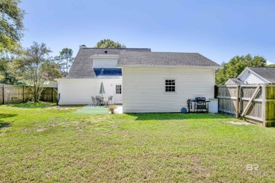 Discover this charming cottage with impressive curb appeal on Lake Forest Yacht and Country Club in Alabama - for sale on GolfHomes.com, golf home, golf lot