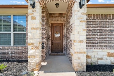 Beautifully maintained 4-bedroom, 2.5-bath home on a half-acre on Pecan Plantation Country Club in Texas - for sale on GolfHomes.com, golf home, golf lot