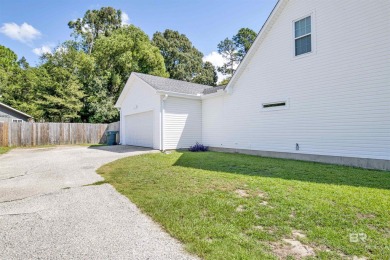 Discover this charming cottage with impressive curb appeal on Lake Forest Yacht and Country Club in Alabama - for sale on GolfHomes.com, golf home, golf lot