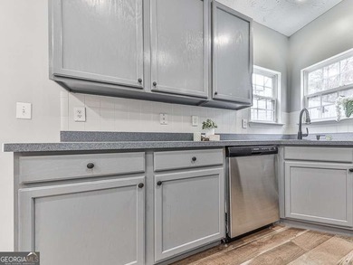 Lake & Golf Cart Living! This beautiful, spacious home offers 5 on Mirror Lake Golf Club in Georgia - for sale on GolfHomes.com, golf home, golf lot