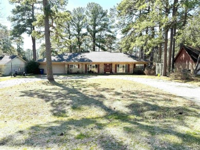 In the heart of RAYBURN COUNTRY, sits this beautiful custom golf on Rayburn Country Club in Texas - for sale on GolfHomes.com, golf home, golf lot