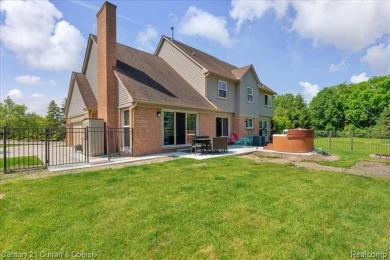 Welcome to 100 Mornington Ct. A beautifully updated brick on Pheasant Run Golf Club in Michigan - for sale on GolfHomes.com, golf home, golf lot