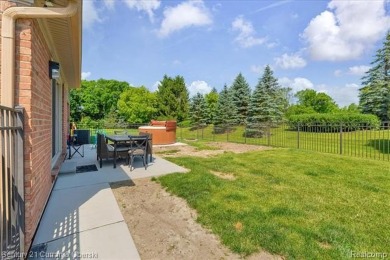 Welcome to 100 Mornington Ct. A beautifully updated brick on Pheasant Run Golf Club in Michigan - for sale on GolfHomes.com, golf home, golf lot