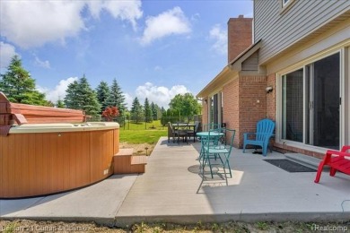 Welcome to 100 Mornington Ct. A beautifully updated brick on Pheasant Run Golf Club in Michigan - for sale on GolfHomes.com, golf home, golf lot