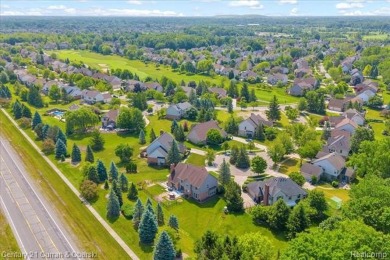 Welcome to 100 Mornington Ct. A beautifully updated brick on Pheasant Run Golf Club in Michigan - for sale on GolfHomes.com, golf home, golf lot