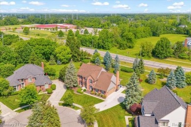 Welcome to 100 Mornington Ct. A beautifully updated brick on Pheasant Run Golf Club in Michigan - for sale on GolfHomes.com, golf home, golf lot