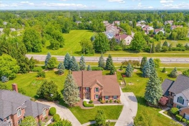 Welcome to 100 Mornington Ct. A beautifully updated brick on Pheasant Run Golf Club in Michigan - for sale on GolfHomes.com, golf home, golf lot