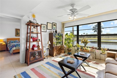 Charming 1st fl condo boasting stunning lake & golf course on Vista Plantation Golf Club in Florida - for sale on GolfHomes.com, golf home, golf lot