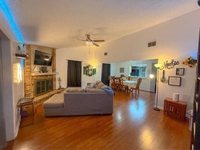 Welcome to Whispering Oaks Estates, where maintenance-free on The Ridge Manor Oaks Golf and Country Club in Florida - for sale on GolfHomes.com, golf home, golf lot