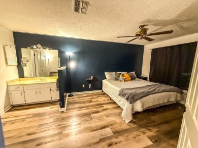Welcome to Whispering Oaks Estates, where maintenance-free on The Ridge Manor Oaks Golf and Country Club in Florida - for sale on GolfHomes.com, golf home, golf lot