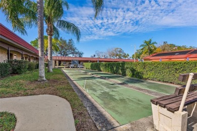 Welcome to this 55+ community of Pinewood Village.  This bright on Clearwater Executive Golf Course in Florida - for sale on GolfHomes.com, golf home, golf lot