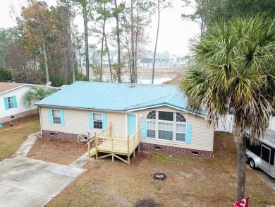 Welcome to 320 Misty Breeze Ln, a charming 3-bedroom, 2-bathroom on Tupelo Bay Golf Complex  in South Carolina - for sale on GolfHomes.com, golf home, golf lot