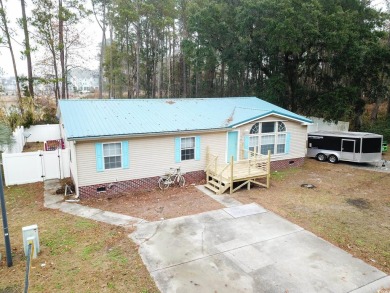 Welcome to 320 Misty Breeze Ln, a charming 3-bedroom, 2-bathroom on Tupelo Bay Golf Complex  in South Carolina - for sale on GolfHomes.com, golf home, golf lot