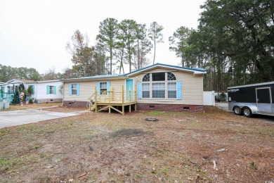 Welcome to 320 Misty Breeze Ln, a charming 3-bedroom, 2-bathroom on Tupelo Bay Golf Complex  in South Carolina - for sale on GolfHomes.com, golf home, golf lot