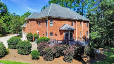 Positioned at the end of a tranquil cul-de-sac within a 24/7 on The Carolina Country Club in South Carolina - for sale on GolfHomes.com, golf home, golf lot