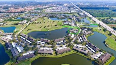 Ground floor unit with lake view.  Washer & Dryer in unit.  Nice on Vista Plantation Golf Club in Florida - for sale on GolfHomes.com, golf home, golf lot