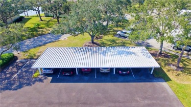 Ground floor unit with lake view.  Washer & Dryer in unit.  Nice on Vista Plantation Golf Club in Florida - for sale on GolfHomes.com, golf home, golf lot