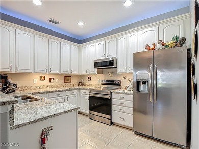 Fabulous End Unit in Solana - Maintenance-Free Living in the on Herons Glen Golf and Country Club in Florida - for sale on GolfHomes.com, golf home, golf lot