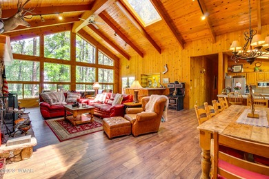 Unbelievable views of the 8th green from the gorgeous deck on White Mountain Country Club in Arizona - for sale on GolfHomes.com, golf home, golf lot