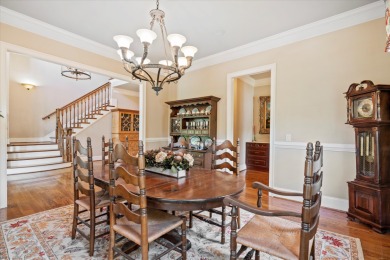 Nestled on a picturesque tree-lined street, this expansive home on Charleston National Golf Club in South Carolina - for sale on GolfHomes.com, golf home, golf lot