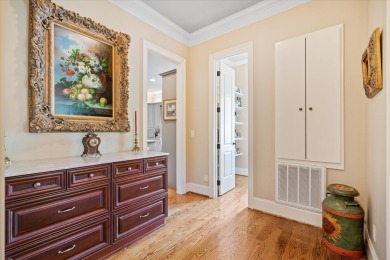 Nestled on a picturesque tree-lined street, this expansive home on Charleston National Golf Club in South Carolina - for sale on GolfHomes.com, golf home, golf lot