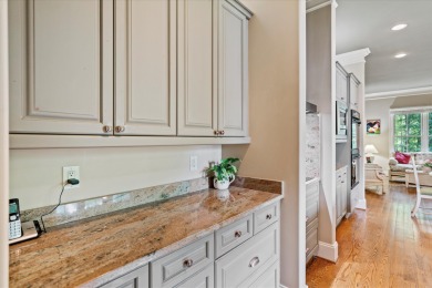 Nestled on a picturesque tree-lined street, this expansive home on Charleston National Golf Club in South Carolina - for sale on GolfHomes.com, golf home, golf lot