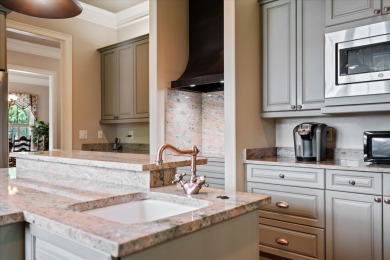 Nestled on a picturesque tree-lined street, this expansive home on Charleston National Golf Club in South Carolina - for sale on GolfHomes.com, golf home, golf lot