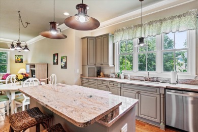 Nestled on a picturesque tree-lined street, this expansive home on Charleston National Golf Club in South Carolina - for sale on GolfHomes.com, golf home, golf lot