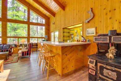 Unbelievable views of the 8th green from the gorgeous deck on White Mountain Country Club in Arizona - for sale on GolfHomes.com, golf home, golf lot
