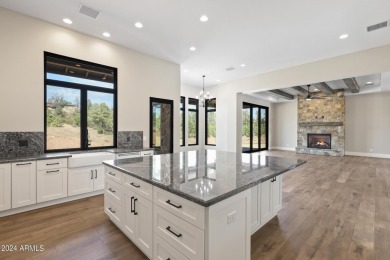 Stunning new WTM Construction home located in the prestigious on The Golf Club At Chaparral Pines in Arizona - for sale on GolfHomes.com, golf home, golf lot