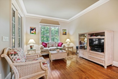 Nestled on a picturesque tree-lined street, this expansive home on Charleston National Golf Club in South Carolina - for sale on GolfHomes.com, golf home, golf lot